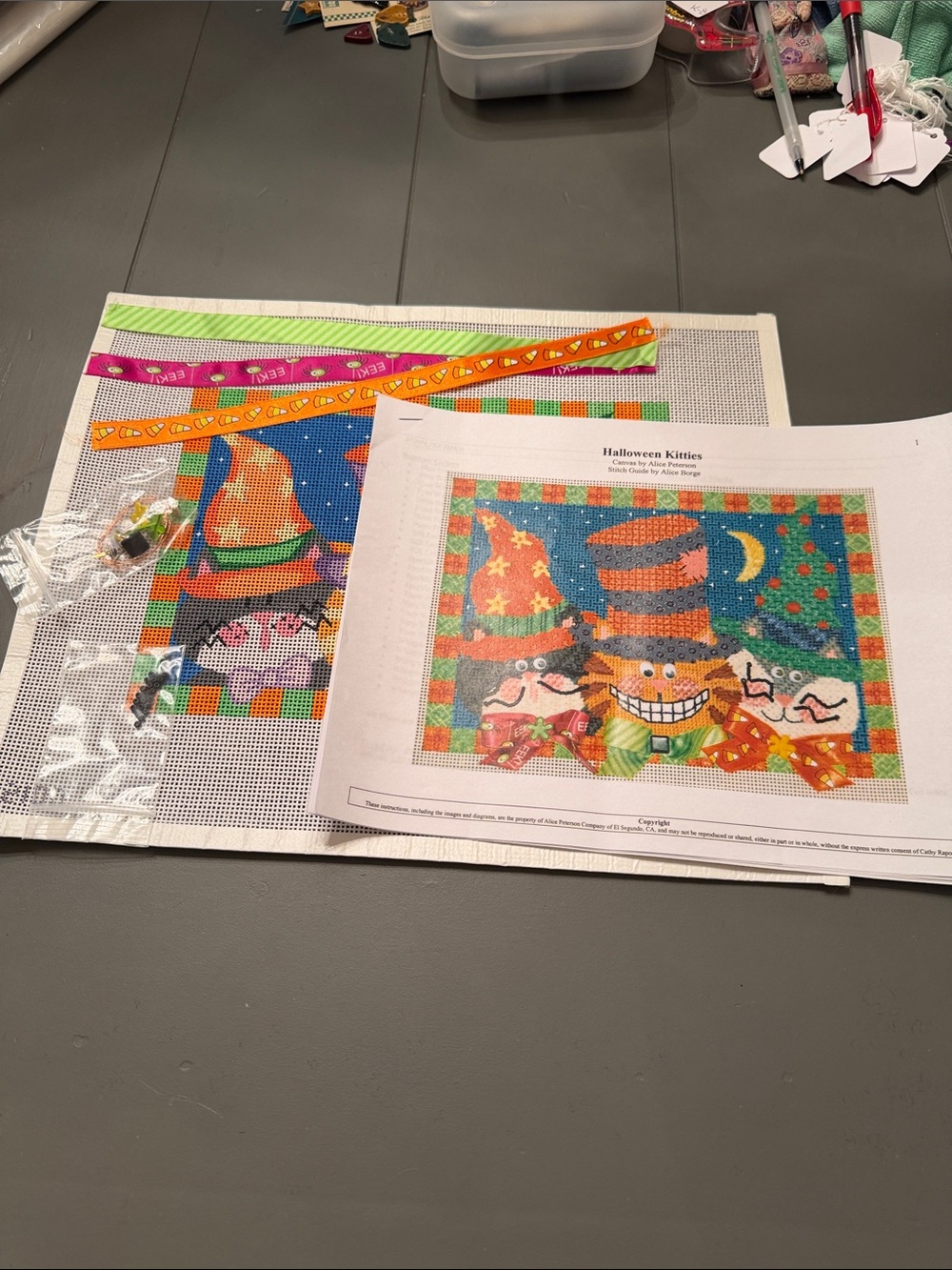 hand-painted needlepoint canvas is titled "Halloween Kitties". 🐈‍⬛ kit